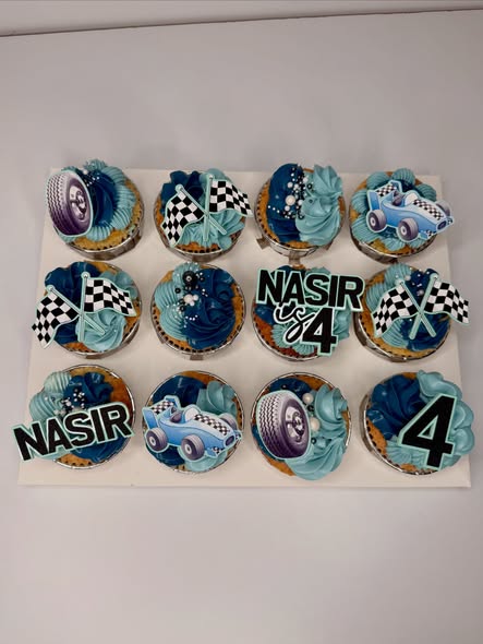 Racing car themed personalised cupcakes with checkered flag toppers